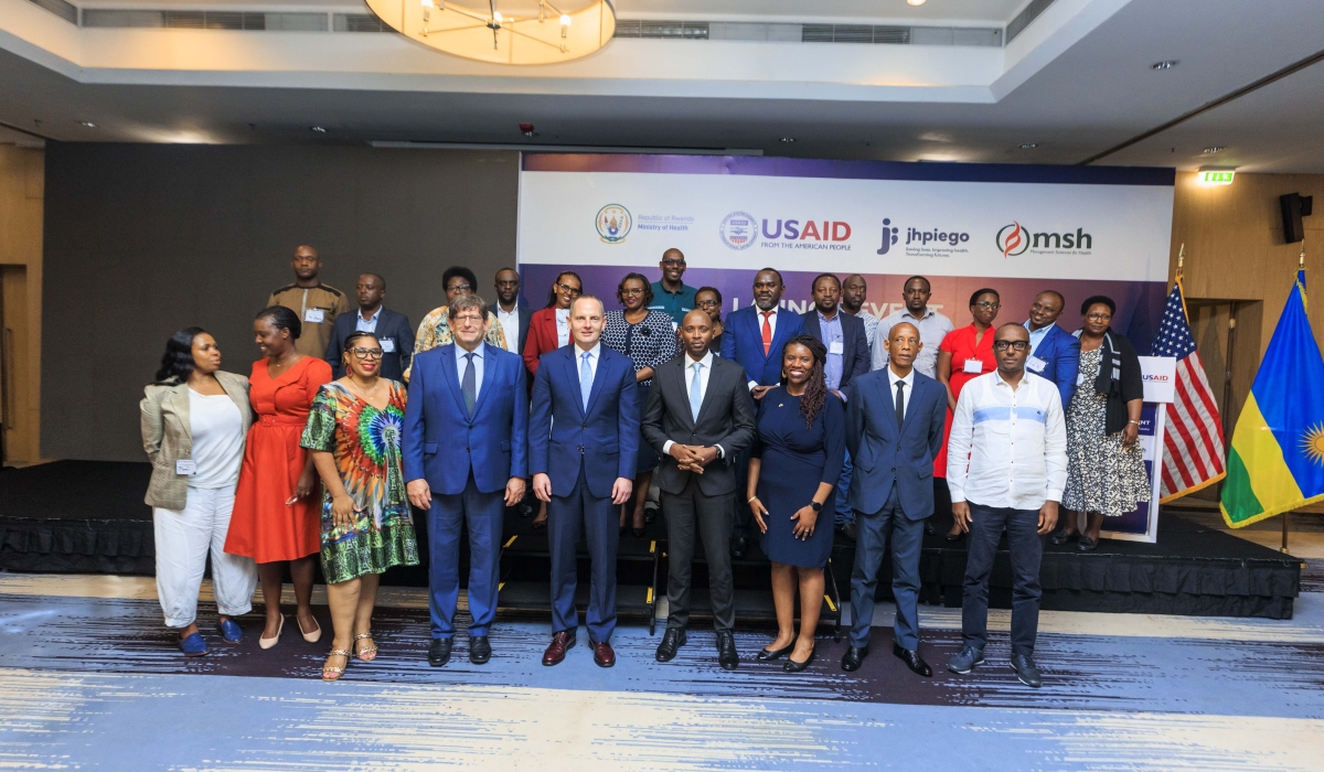 Officials pose for a grouphoto as   as USAID announced the two projects Ireme (&#039;Quality&#039;) and Tubeho (&#039;Let’s live&#039;),    On December 8, in Kigali. Courtesy.