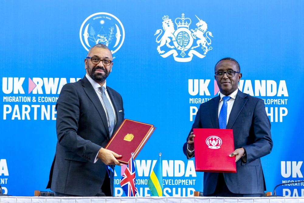 The Minister of Foreign Affairs and International Cooperation, Dr Vincent Biruta, and UK Home Secretary James Cleverly during the signing of a new migration treaty between the two countries in Kigali, December 5 