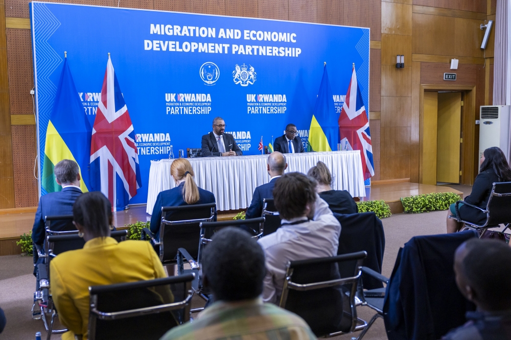 The Minister of Foreign Affairs and International Cooperation, Dr Vincent Biruta and UK Home Secretary James Cleverly address journalists during the signing of a new migration treaty in Kigali, December 5. PHOTO BY OLIVIER MUGWIZA