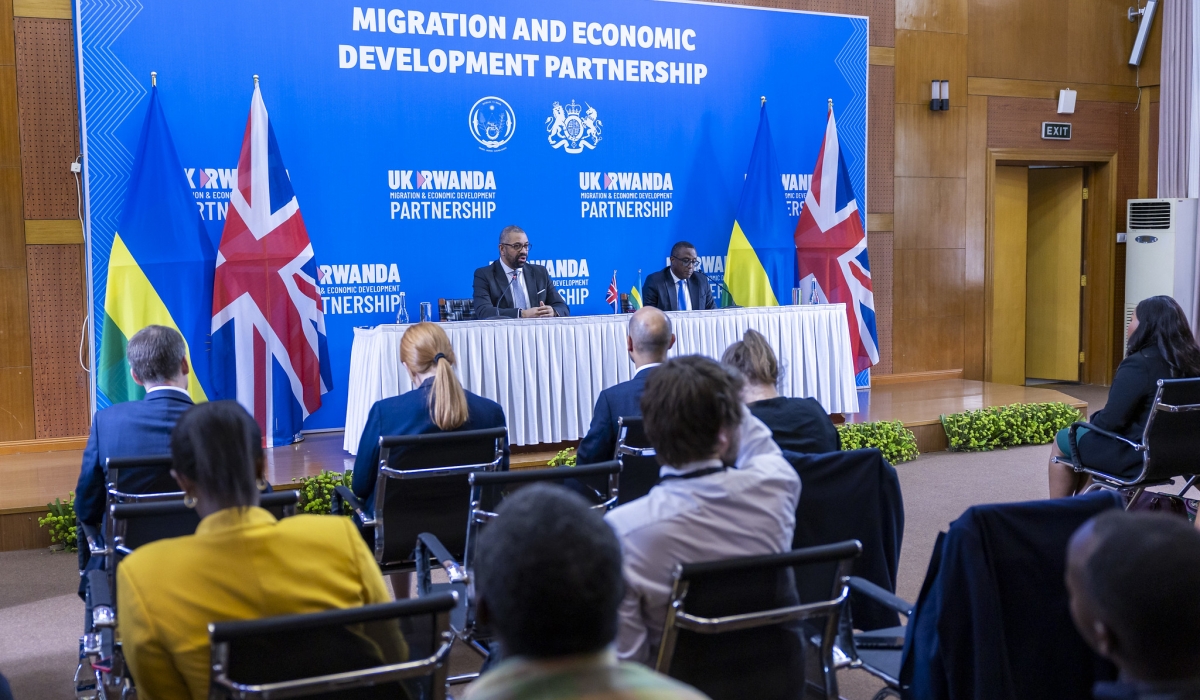 The Minister of Foreign Affairs and International Cooperation, Dr Vincent Biruta and UK Home Secretary James Cleverly address journalists during the signing of a new migration treaty in Kigali, December 5. PHOTO BY OLIVIER MUGWIZA
