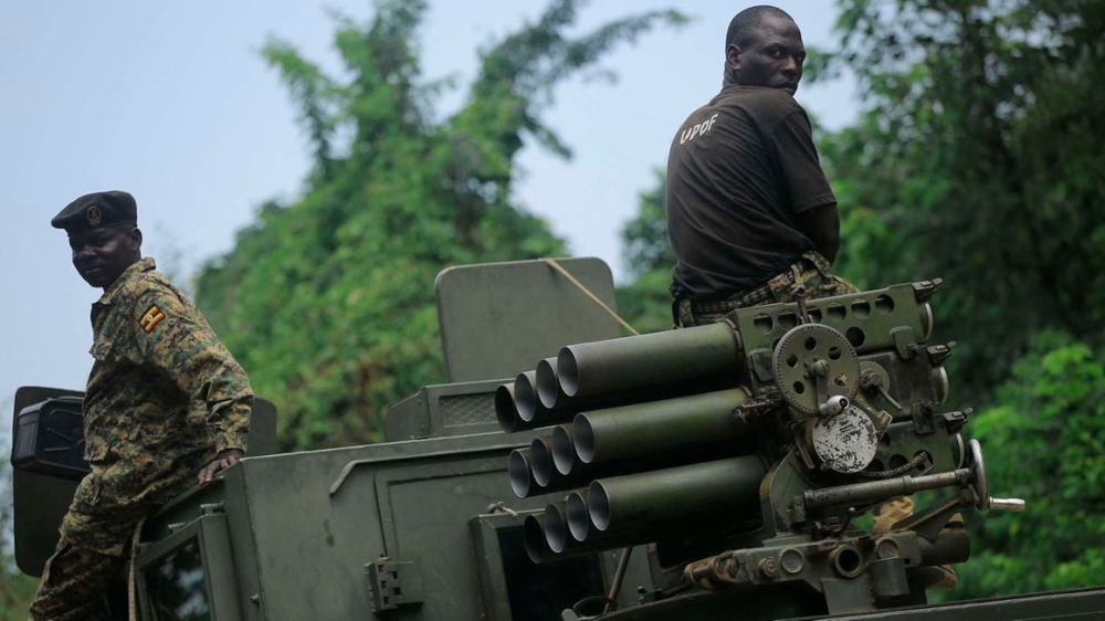 Uganda People&#039;s Defence Forces troops are seen on the Mabau-Kamango road in the Beni District, DRC on December 8, 2021. PHOTO _ AFP