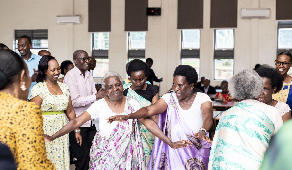 Some of Intwaza dance with members of the Unity Club during an event to celebrate festive season at Impinganzima Hostel in Bugesera District . Courtesy