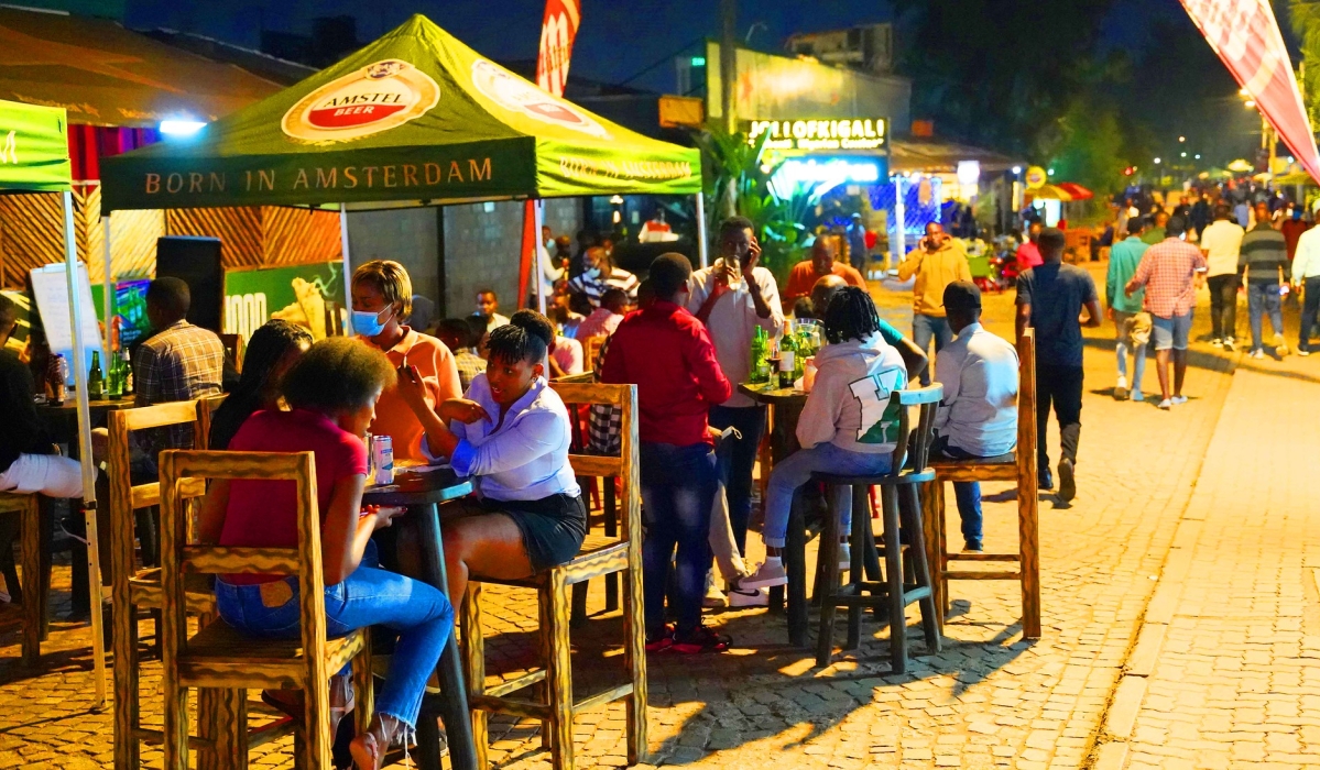 Clients share a drink at Kisimenti Car Free Zone.RDB is due to release new guidelines for nighttime entertainment activities for the festive season. Photo by Craish Bahizi
