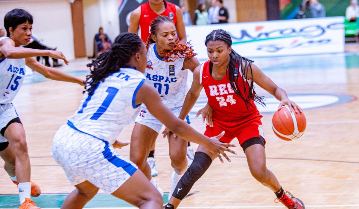 REG&#039;s point guard Nia Clouden dribbles the ball during the game against ASPAC
