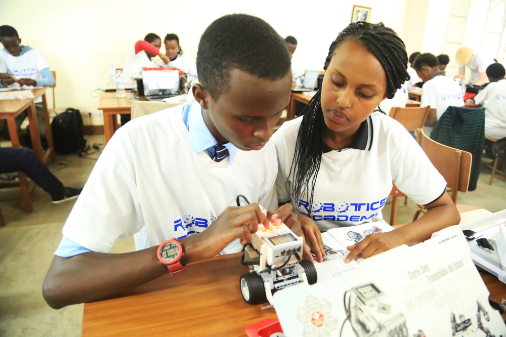 Students during a robotic bootcamp at Lycee de Kigali. REB is considering the likelihood of including educational robotics courses into the national curriculum. SAM NGENDAHIMANA