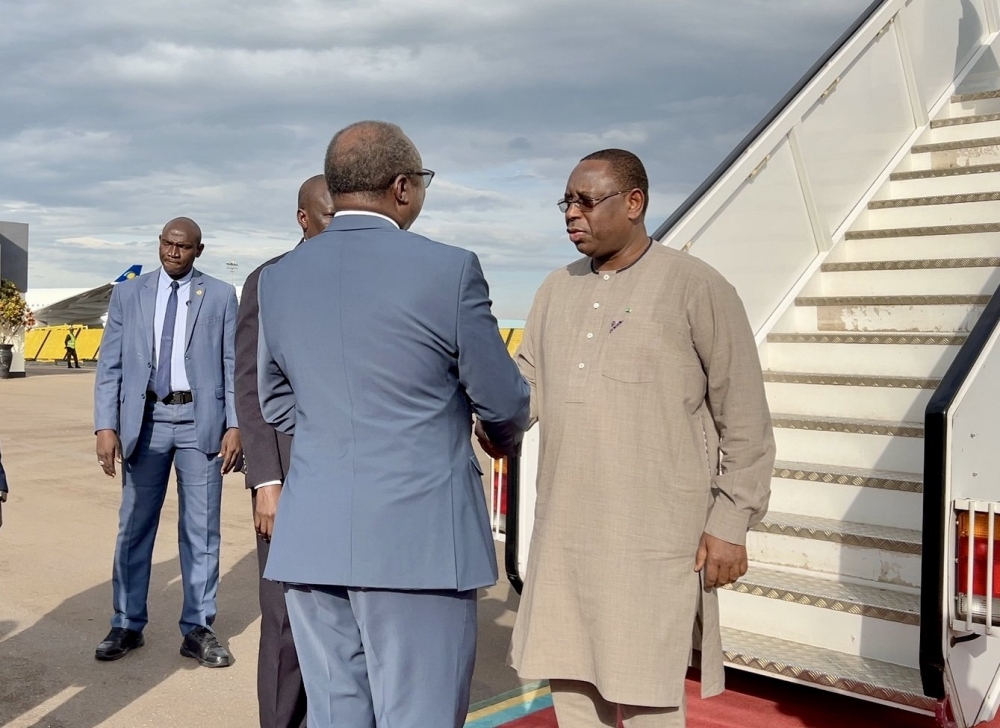 Senegal&#039;s President Macky Sall arrives at Kigali International Airport ahead of  the inauguration of BioNTech Africa, a cutting-edge manufacturing facility for mRNA-based vaccines on Monday, December 18. PHOTO BY RBA