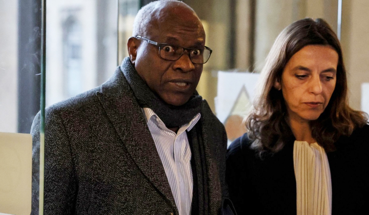 Genocide suspect Sostherne Munyemana with his lawyer. French prosecutors have called for a 30-year prison sentence for his role in the 1994 Genocide against the Tutsi. Internet