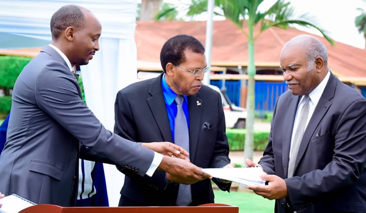 Minister of Health Dr Sabin Nsanzimana, Hesron Byiringiro the president of the Seventh-day Adventist Church and Dr Zeno L. Charles-Marcel, the Assoc. Director of Adventist Health Ministry at the Headquarters of the SDA World Church during the handover on Friday, December 15. Courtesy.