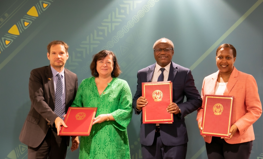 Officials pose for a photo during the signing ceremony of a grant agreement worth €15.6 million between Development Bank of Rwanda (BRD) and Germany’s KfW Development Bank. Courtesy