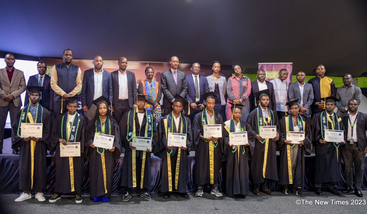 Officials pose for a group photo with graduates at the graduation ceremony for the fifth cohort of the Igire programme on Tuesday, December 19. Photos by Emmanuel Dushimimana