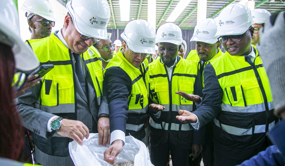 (L-R): CEO of OCP Africa, Mohamed Anouar Jamali, Managing Director of Rwanda Fertilizer Company (RFC), Anass Khanchoufi, Minister of Agriculture and Animal Resources, Ildephonse Musafiri, Director General of Agriculture Modernisation at MINAGRI, Patrick Karangwa, and Minister of Trade and Industry, Jean-Chrysostome Ngabitsinze observe fertiliser samples during the official launch of the Rwanda Fertilizer Blending Plant in Bugesera District on December 20, 2023.The newly launched factory has an annual capacity to blend 100,000 tonnes of fertilisers.