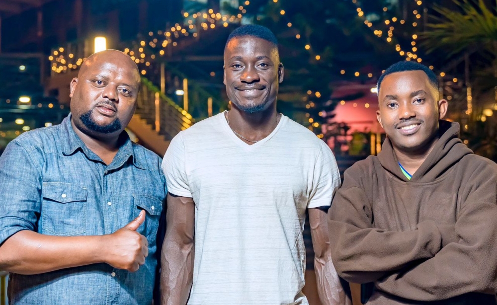 Paul  Gomis (C) was received a warm welcome by Rayon&#039;s Spokesperson, Roben Ngabo and fans’ club President Claude Muhawenimana. in Kigali on   Friday, December 21. Photo Courtesy.