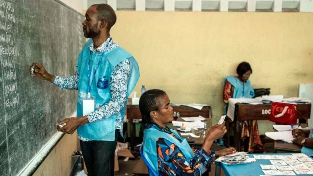 Officials from the Independent National Electoral Commission start counting votes in Kinshasa, DRC on December 21, 2023. PHOTO . AFP