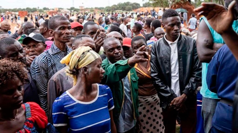 A voter argues with an official from the Independent National Electoral Commission at a polling station at Bwakya school in Lubumbashi, DRC on December 20, 2023. PHOTO | AFP