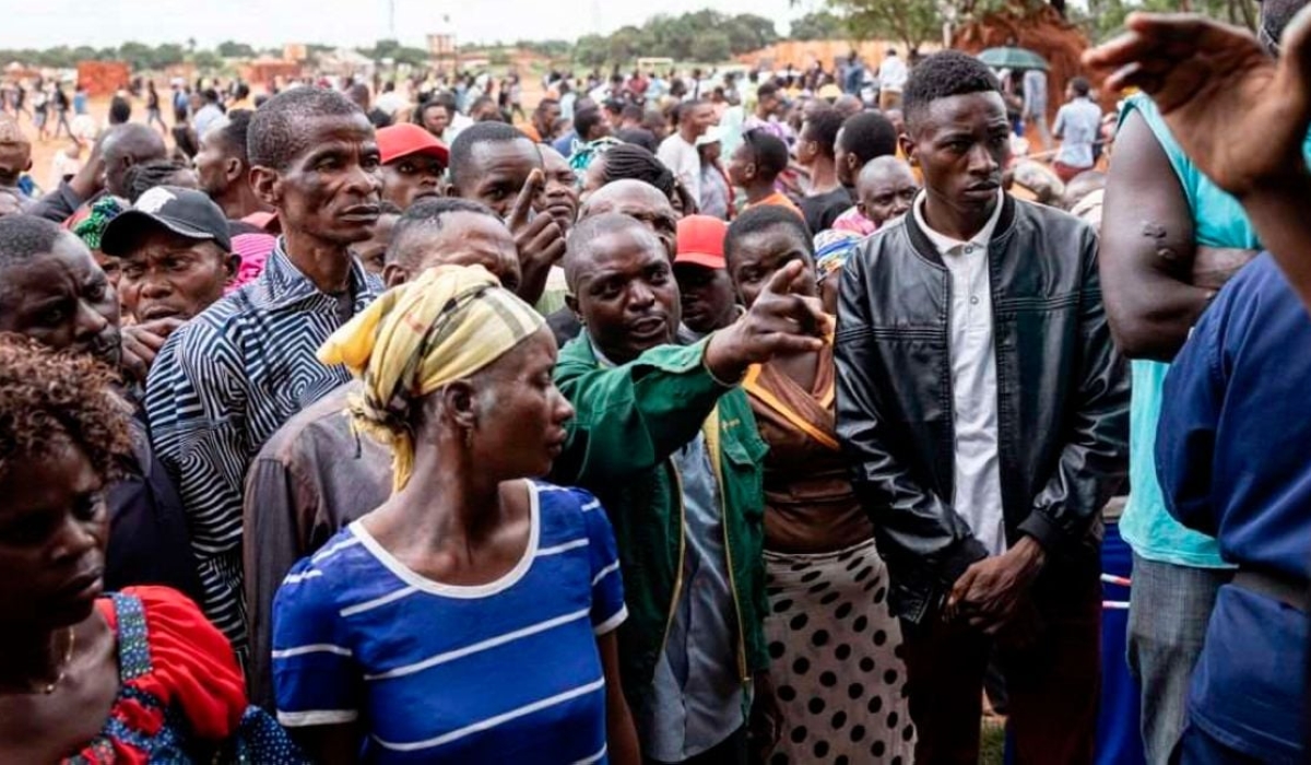 A voter argues with an official from the Independent National Electoral Commission at a polling station at Bwakya school in Lubumbashi, DRC on December 20, 2023. PHOTO | AFP