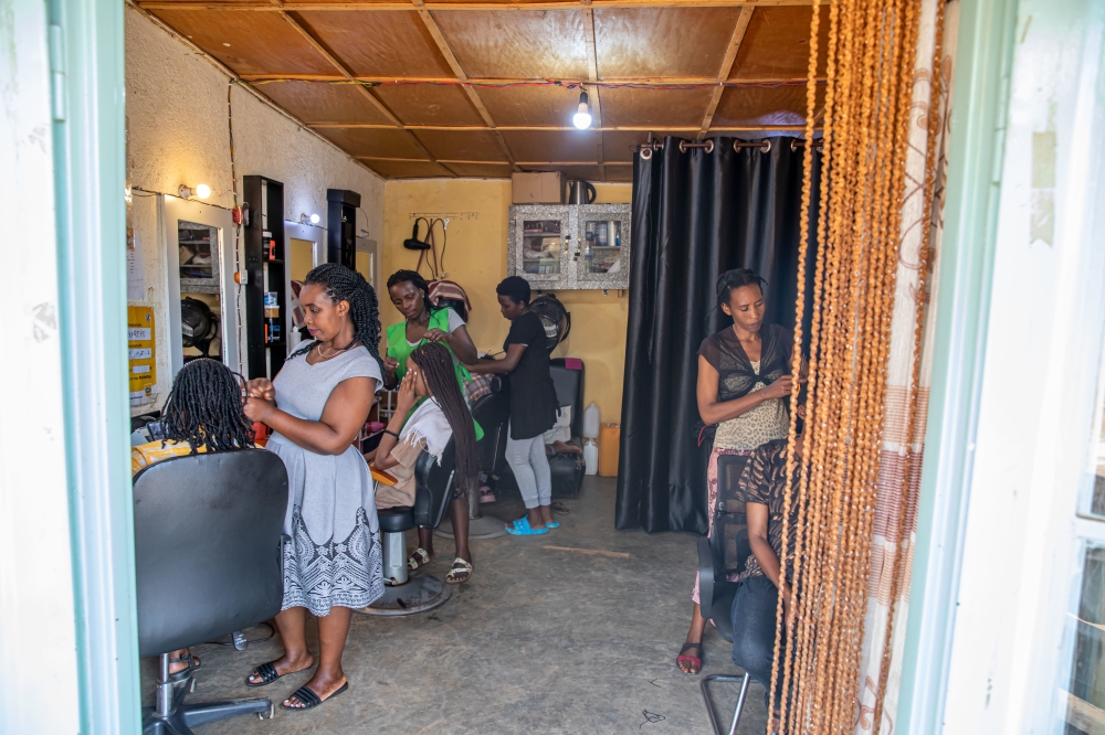 Yvette Murekatete and three other women started a beauty salon in Nyarugunga, Kicukiro, thanks to the UN Women project. Photos by Willy Mucyo