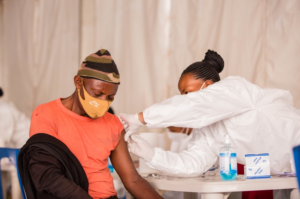 A health worker during the Covid 19 vaccination exercise in 2022. Photo by Craish Bahizi