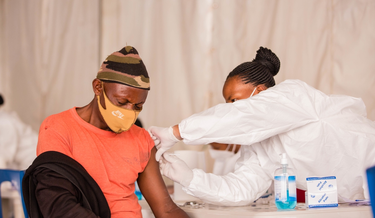 A health worker during the Covid 19 vaccination exercise in 2022. Photo by Craish Bahizi