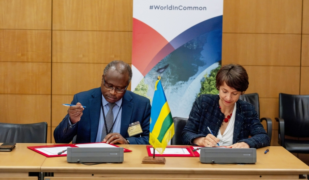 Minister for Finance and Economic Planning, Uzziel Ndagijimana signs for a new initiative for mobilizing €300 million for climate resilience in Rwanda, at the Paris Summit for a New Global Financing Pact on Thursday June 22. Courtesy
