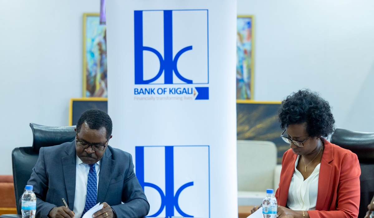 Vincent Munyeshyaka, the BDF chief executive and Diane Karusisi, the BK Chief Executive signed a partial credit fund agreement to lend to more clients   on Wednesday, December 27. Courtesy