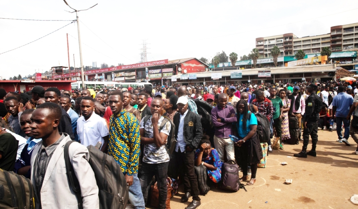 Thousands of travellers from Kigali wait for buses on Sunday, as they headed upcountry to celebrate Christmas with their families. Photo by Craish Bahizi