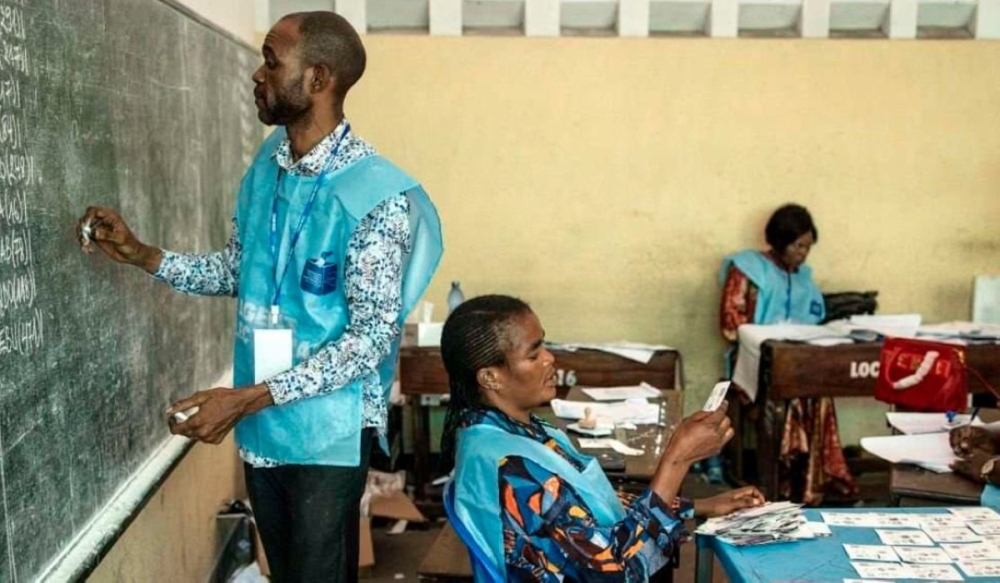 Officials from the Independent National Electoral Commission start counting votes in Kinshasa, DRC on December 21, 2023. PHOTO: AFP