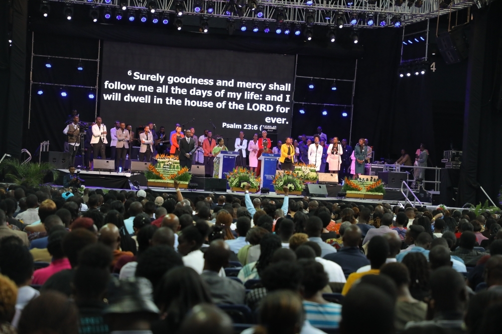 Believers from Zion Temple Celebration Center and other christian denominations during the cross over mass gathering of praise and worship at the BK Arena on New Year&#039;s eve in 2023. Dan Gatsinzi