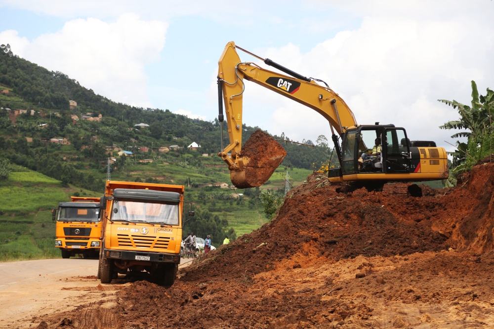 Workers on duty during Kigali-Gatuna road rehabilitation. Minister of Justice has approved the expropriation of assets in public interest along four roads set to be constructed. Sam Ngendahimana