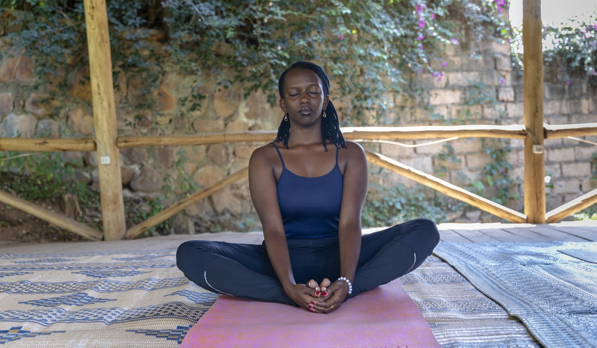 Jade Iriza Natasha during a yoga practice session in Kigali. The seamless interaction between mental and physical well-being plays a vital role in nurturing a balanced and satisfying life. Photo by Christianne Murengerantwari.