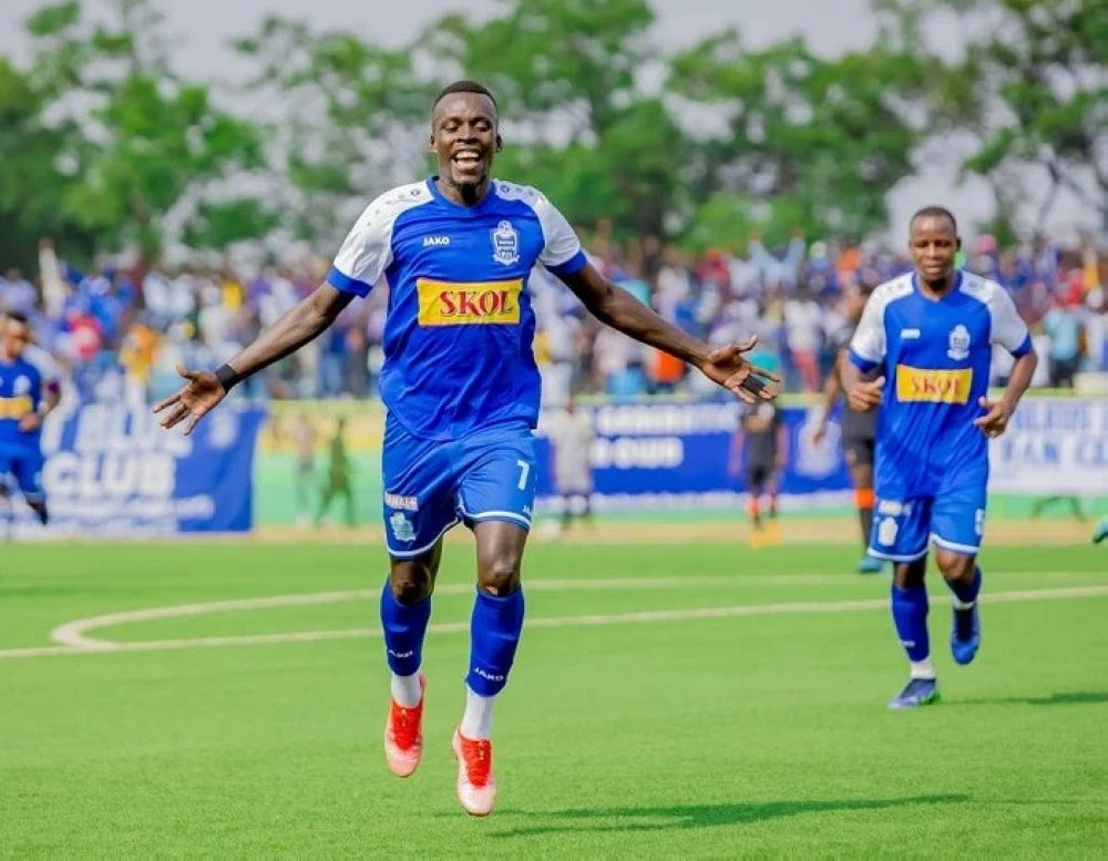 Rayon Sports striker Musa Esenu celebrates a goal during a past game against Gasogi United. The Blues have parted ways with the Ugandan striker. Courtesy