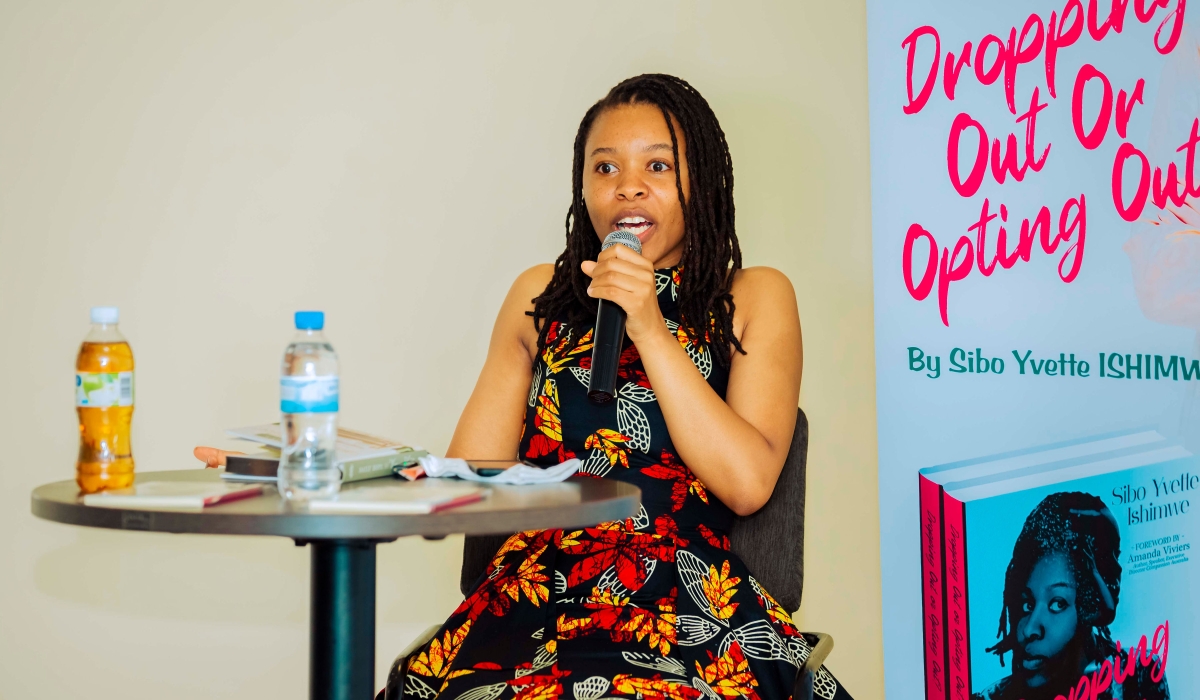 Sibo Yvette Ishimwe talking about her autobiography "Dropping Out or Opting Out?" during the launch and signing event on January 6 at Highlands Suites Hotel, Nyarutarama. COURTESY PHOTOS