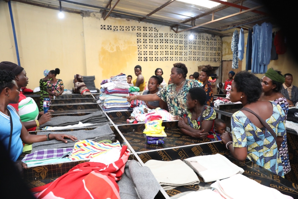 Former street vendors at the newly unveiled mini-market  that was set up for them. Courtesy
