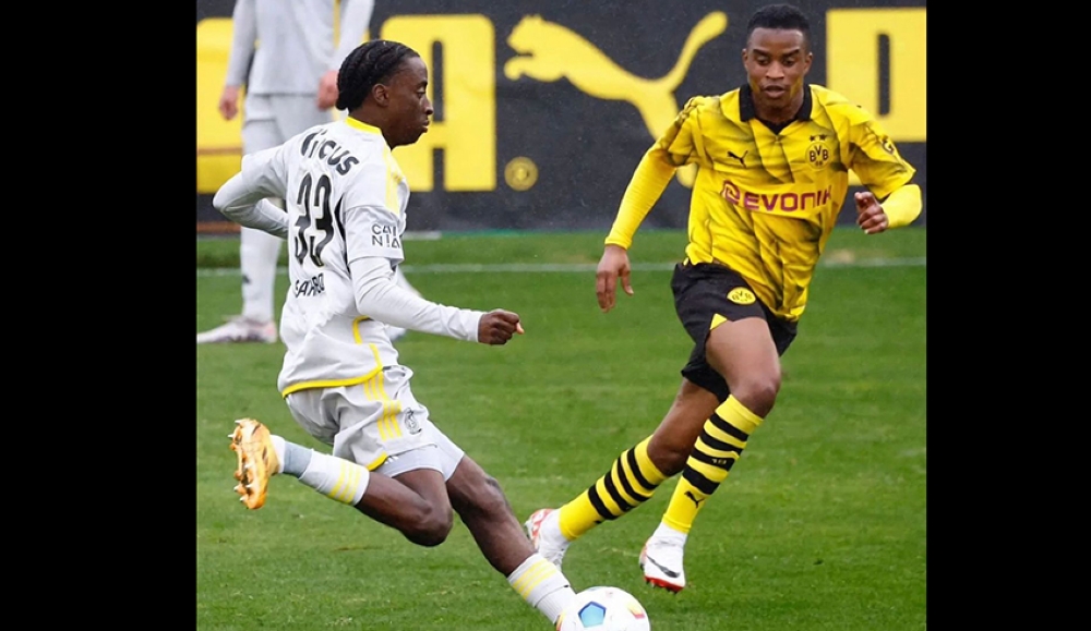Rwanda international Hakim Sahabo  in action for the first team of Standard Liege during the club&#039;s 3-3 thrilling draw against German giants Borussia Dortmund. Courtesy