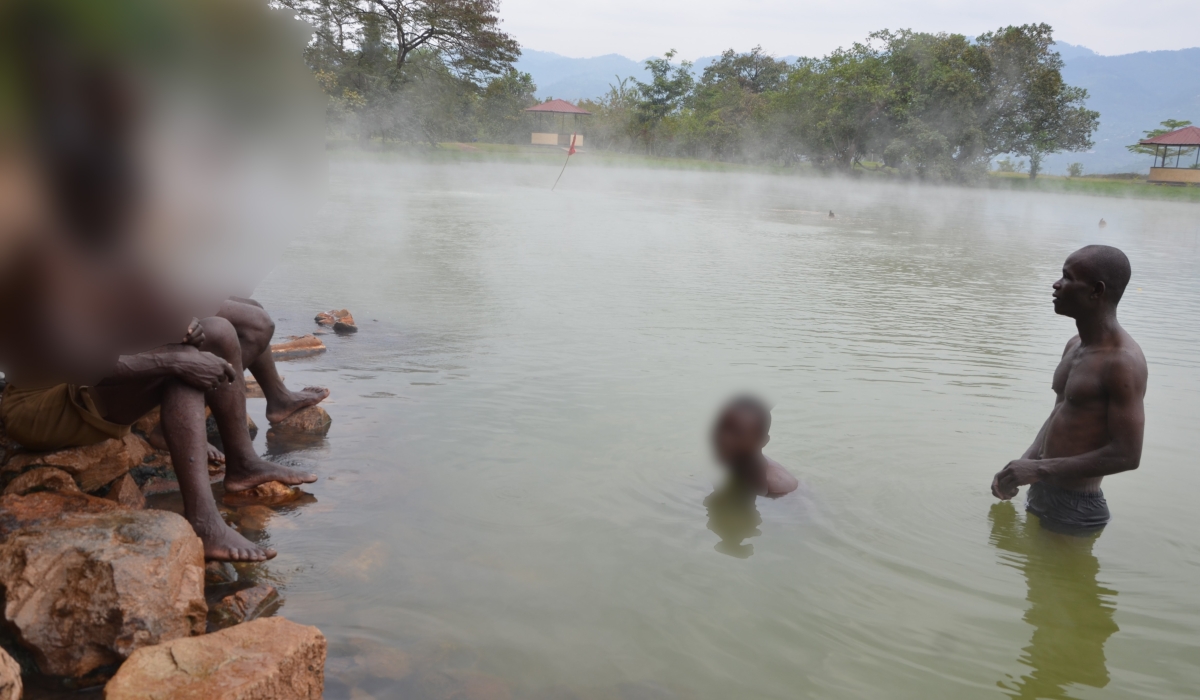 Residents enjoy swimming in the Bugarama hot spring located in the Nyakabuye sector of Rusizi District. Sam Ngendahimana