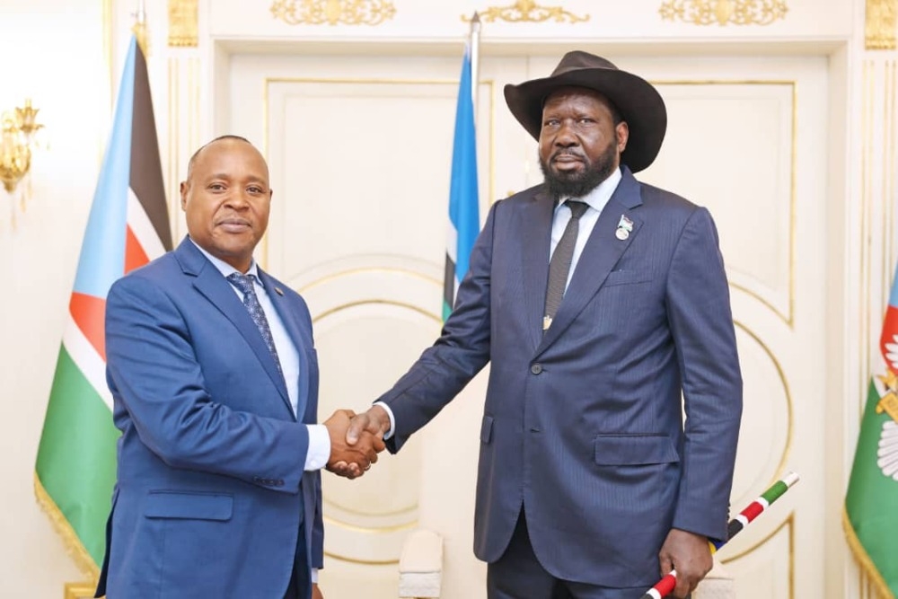 EAC Secretary General Peter Mathuki [L] shakes hands with EAC Heads of State Summit Chairperson, Salva Kiir Mayardit, in Juba, South Sudan. Mathuki briefed Kiir on inter-state relations in the region. Courtesy photo