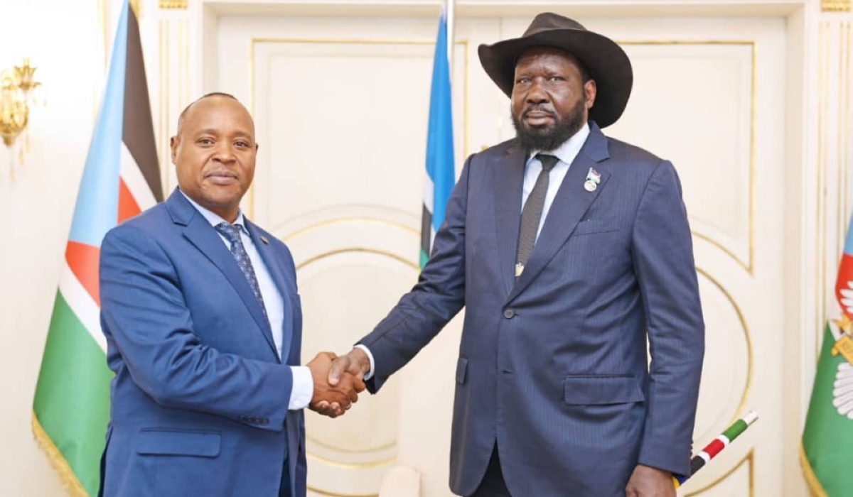EAC Secretary General Peter Mathuki [L] shakes hands with EAC Heads of State Summit Chairperson, Salva Kiir Mayardit, in Juba, South Sudan. Mathuki briefed Kiir on inter-state relations in the region. Courtesy photo