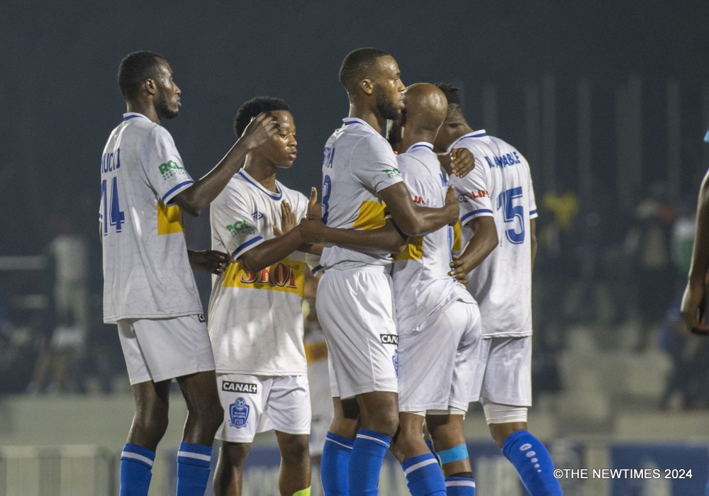 Rayon Sports players celebrate a 4-0 victory over  Interforce in the first leg of the Peace Cup quarterfinals at Kigali Pele Stadium on Tuesday, January 16. PHOTOS BY CRAISH BAHIZI