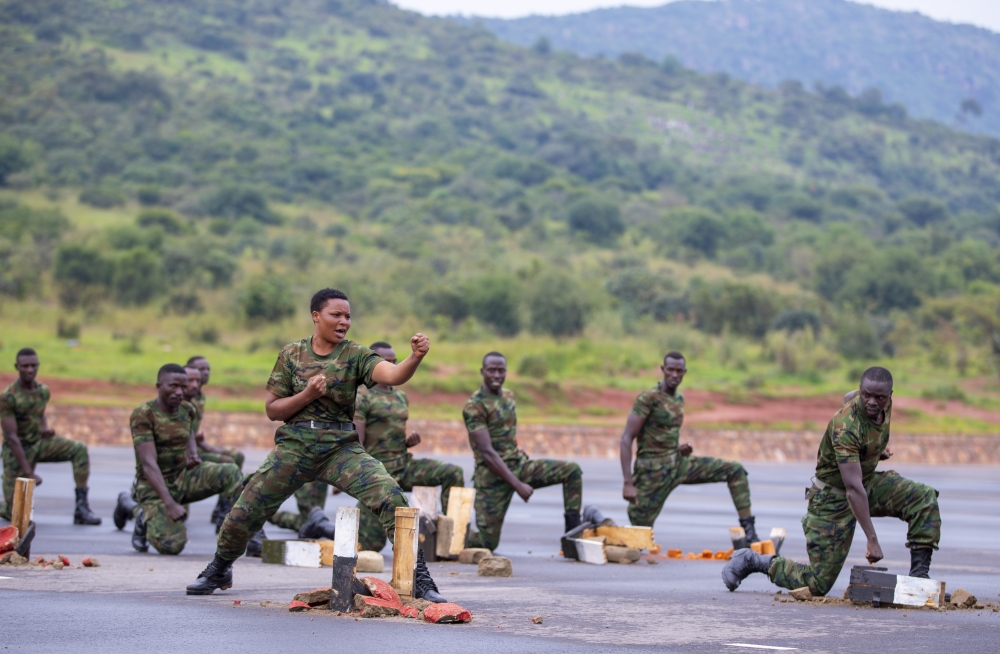 An RDF soldier showcases her martial arts skill during the graduation ceremony for advanced infantry trainees at Nasho Basic Military Training Center in Kirehe District, on Wednesday, January 17, 2024. All photos courtesy of RDF