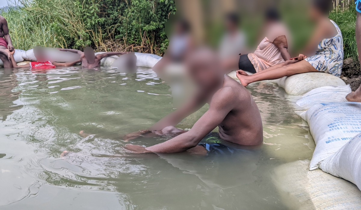 Some residents who turned up to swim at Nyamyumba hot springs  Photo by Germain Nsanzimana