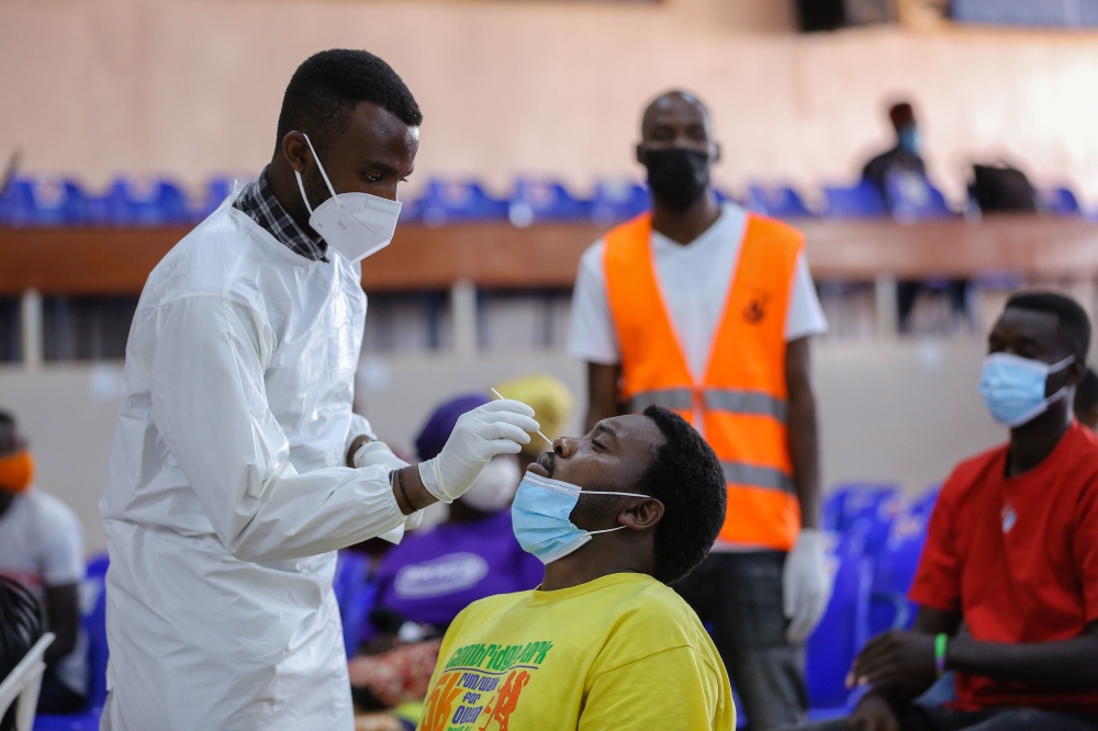 A health worker during mass test exercise of Covid 19  in Kigali on July 23, 2021. RBC clarifies upsurge of flu-like syndrome not linked to Covid-19