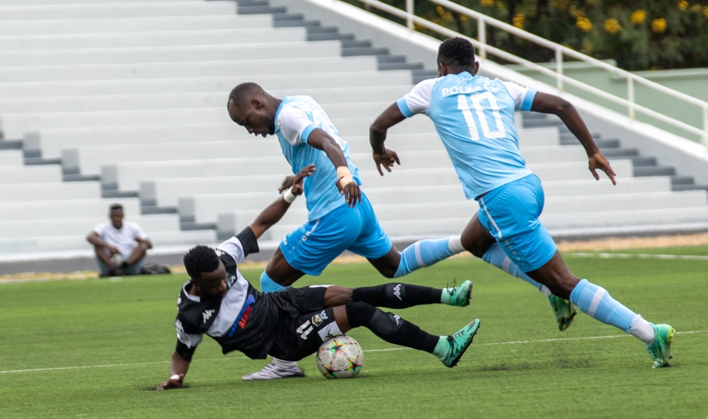 APR FC striker Gilbert Mugisha vies for the ball against Police FC during a past match. The two sides will face at Kigali Pele Stadium  on Sunday, January 21. Olivier Mugwiza