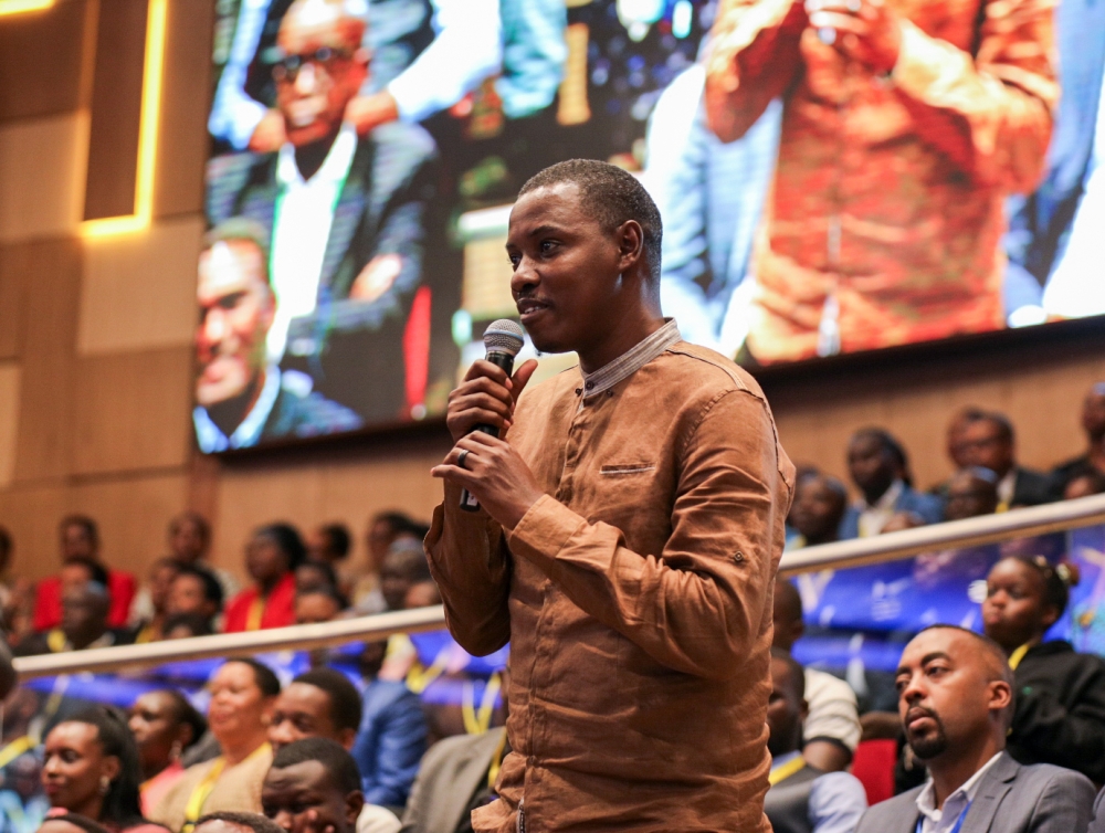 The current Amavubi assistant coach Jimmy Mulisa asks a question during the 19th edition of the National Dialogue Council ‘Umushyikirano’ in Kigali on Wednesday, January 24. Photo by Dan Gatsinzi