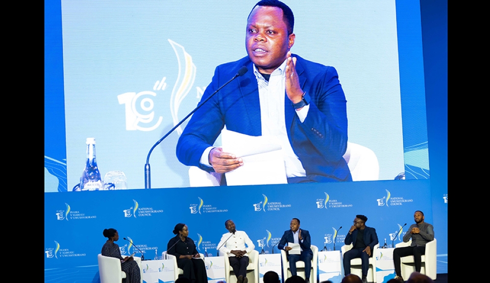 Minister of Youth and Arts, Abdallah Utumatwishima speaks at a panel discussion on the second and final day of the 19th National Dialogue Council - Umushyikirano