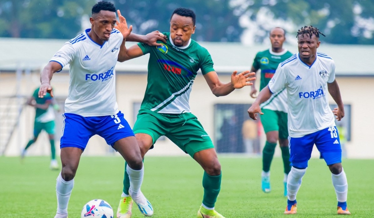 Gorilla FC and SC Kiyovu players vie for the ball during the second leg game. Gorilla secured a quarter-final berth in Peace Cup  despite losing 3-1 to Kiyovu at Kigali Pelé Stadium on Tuesday, January 23. Julius Ntare