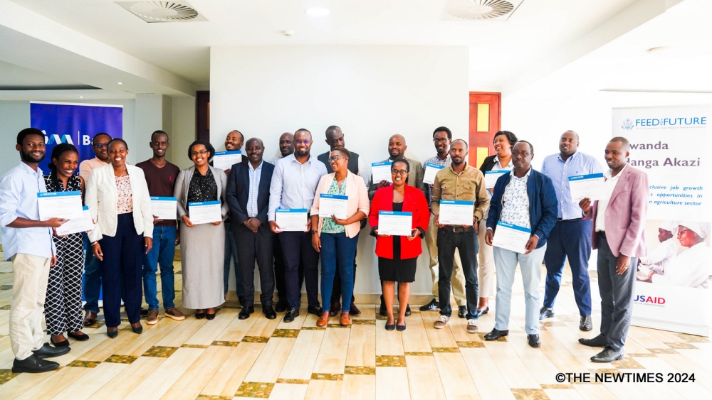 The participants pose for a group photo after the training in Kigali on January 24.