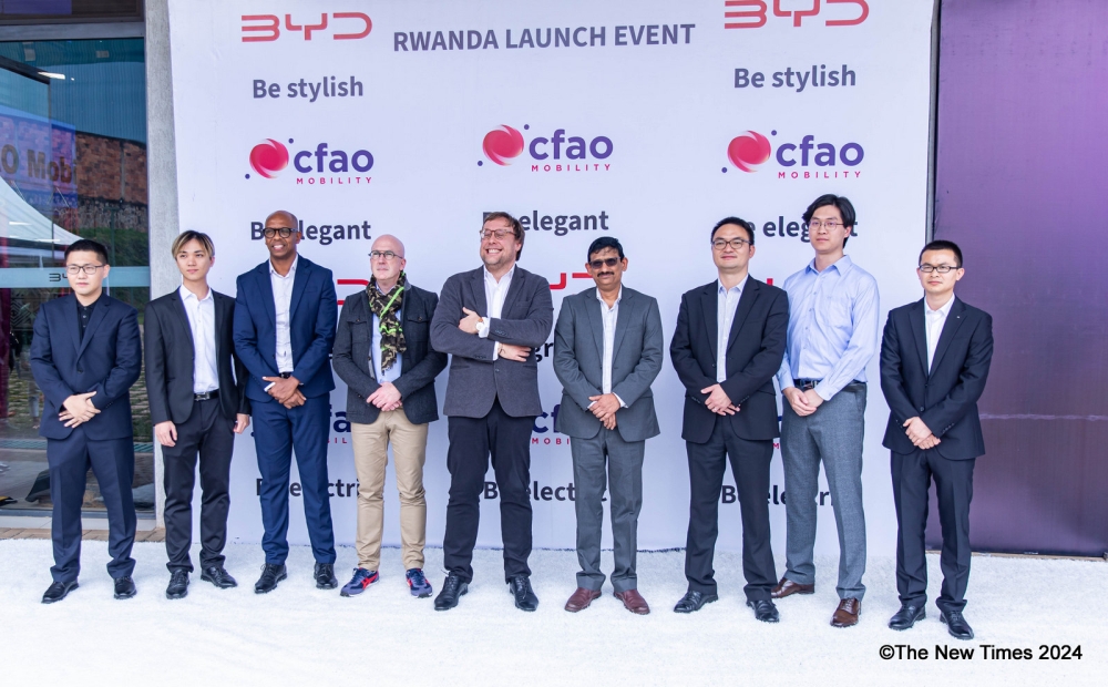 Delegates pose for a group photo during the Launch of the BYD electric car dealership in Kigali, on Thursday, January 25. Dan Gatsinzi