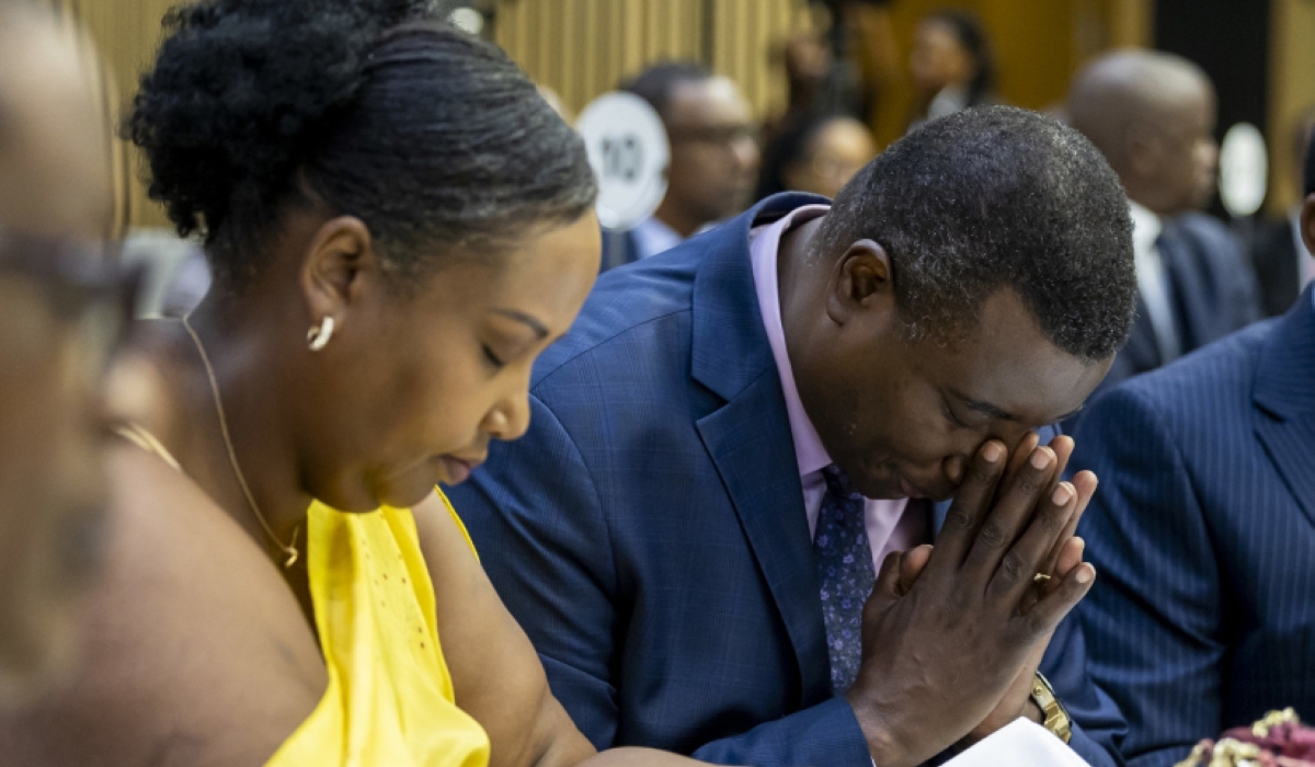 Apostle Paul Gitwaza, the senior pastor at Zion Temple (C) during the 29th annual National Prayer Breakfast at Kigali Convention Centre on Sunday, January 14. Courtesy
