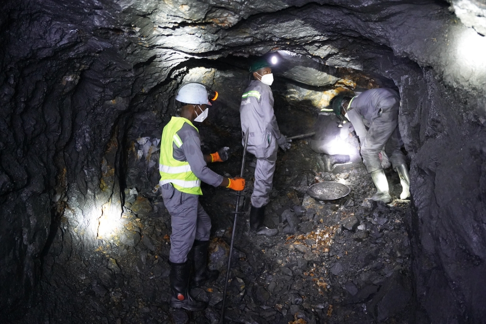 Miners  work inside a tunnel at a mining site in Gakenke District. Photo by Craish BAHIZI