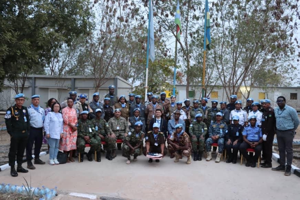 Officials  pose for a group photo with the decorated officers. The medal pinning ceremony took place in Upper Nile state, Malakal.