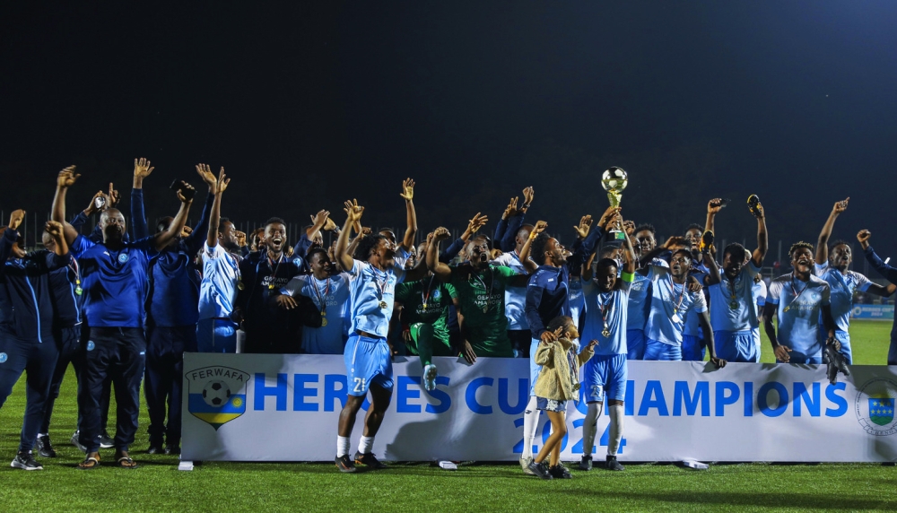 Police FC players and staff celebrating the trophy after beating APR FC 2-1 to win the 2024 Heroes Cup on February 1. All photos by Craish BAHIZI